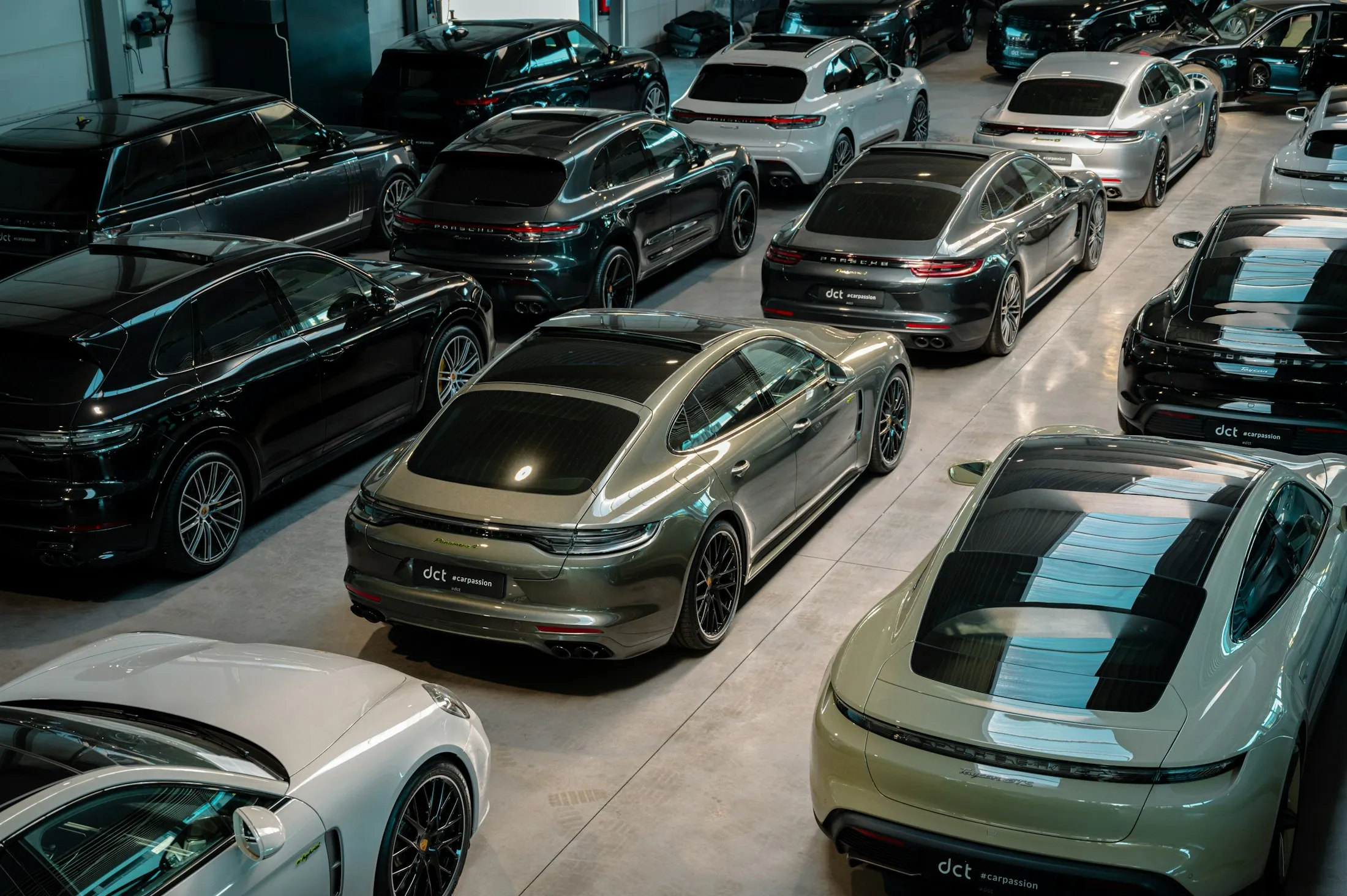Row of cars in a garage with a glossy charcoal flake floor