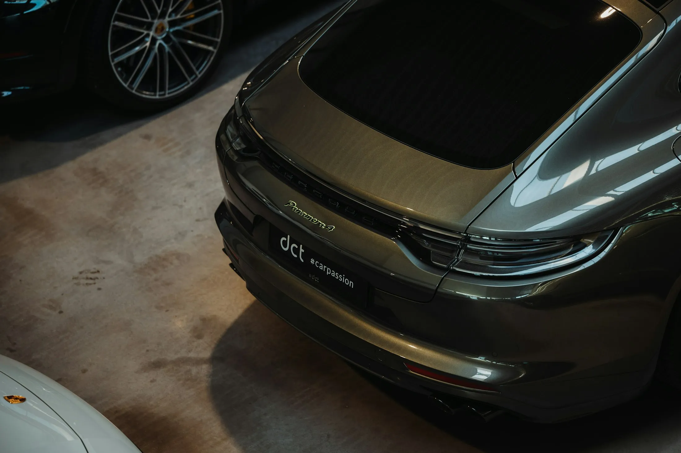 Silver car in a garage with a light grey epoxy floor
