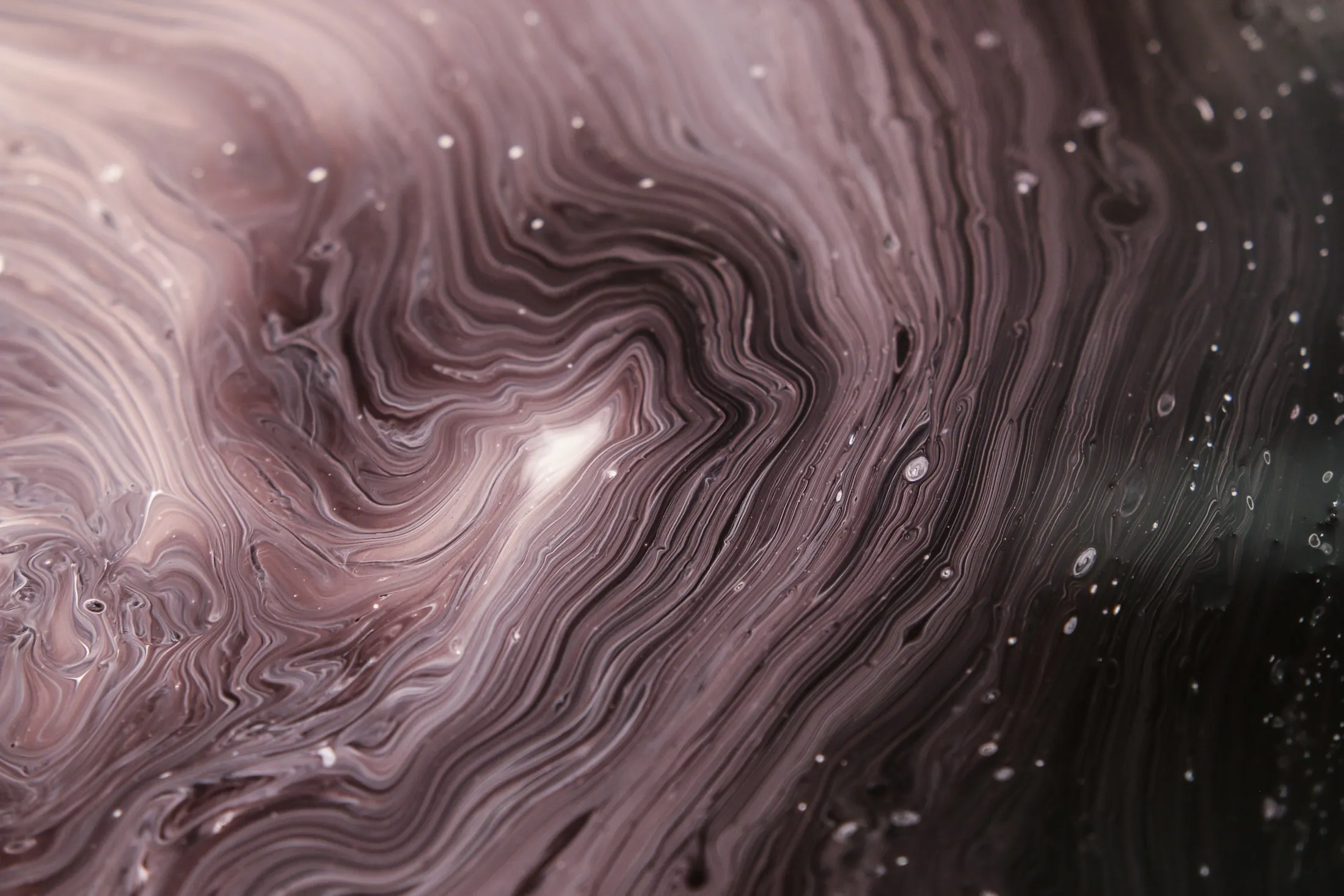 Swirling dark metallic resin with fine highlights